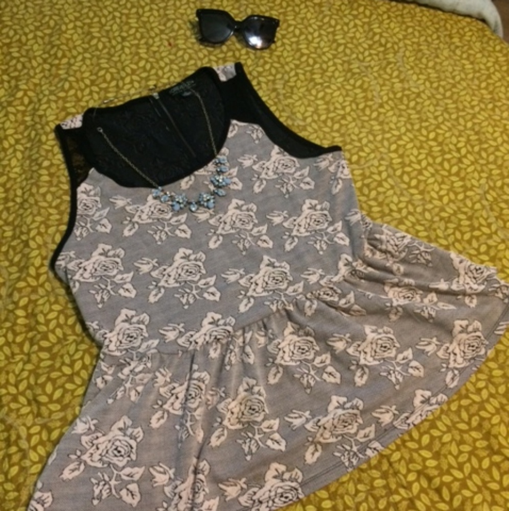 Cute peplum sleeveless top
